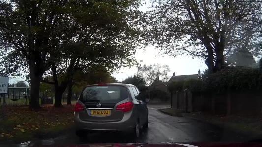 Brown Vauxhall Meriva (BF61UOJ)