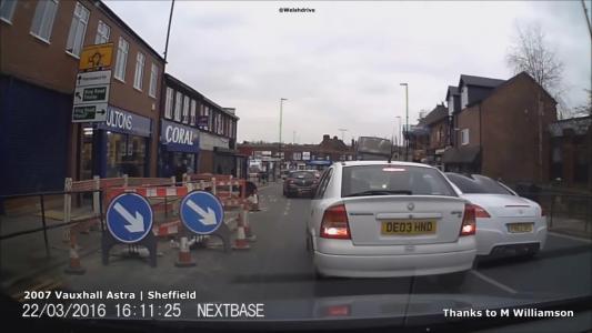 White Vauxhall Astra (DE03HND)