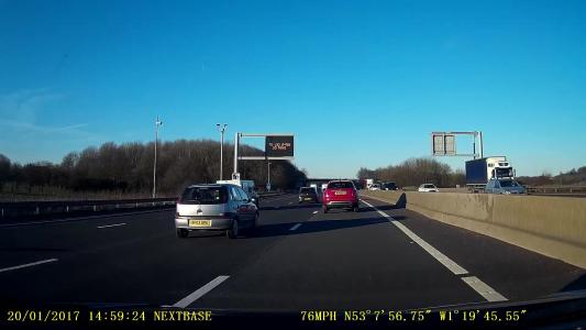 Silver Vauxhall Corsa (DF03UPG)