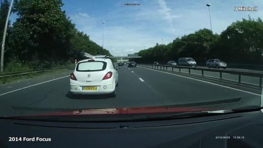 White Vauxhall Corsa (FE58FFJ)