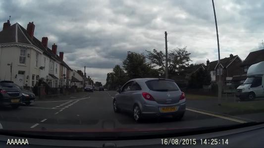 Silver Vauxhall Corsa (KL07ZHD)