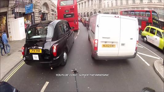 Black London taxis int Tx4 (LP14XNB)