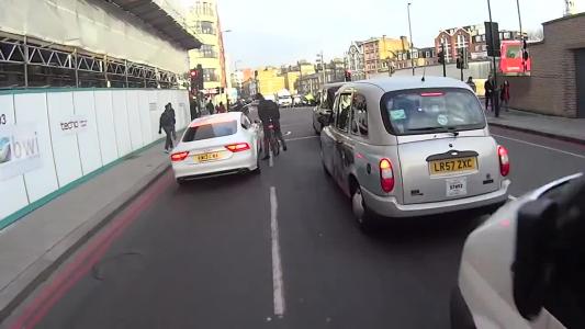 Multi-coloured London taxis int Tx4 silver auto (LR57ZXC)