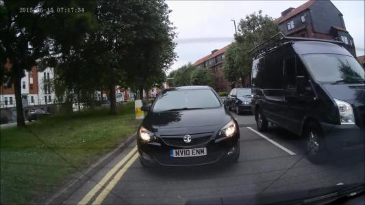 Black Vauxhall Astra (NV10ENM)