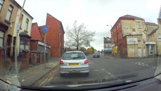 Silver Peugeot 206 (PF06HDZ)