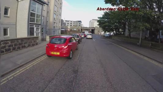 Red Vauxhall Corsa (SW63MFP)