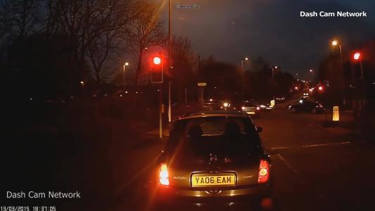 Black Nissan Micra (YA06EAM)