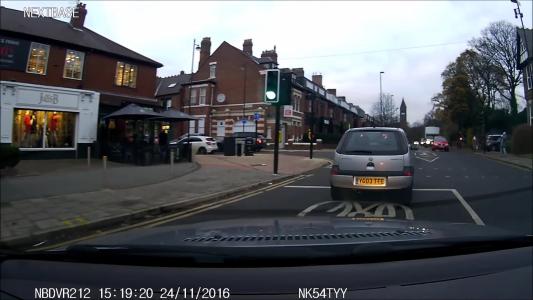 Silver Vauxhall Corsa (YG03TTE)