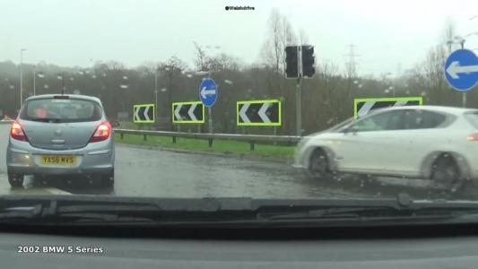 Blue Vauxhall Corsa (YX56MVS)