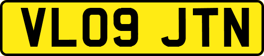 VL09JTN