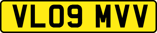 VL09MVV