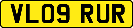 VL09RUR