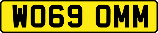 WO69OMM